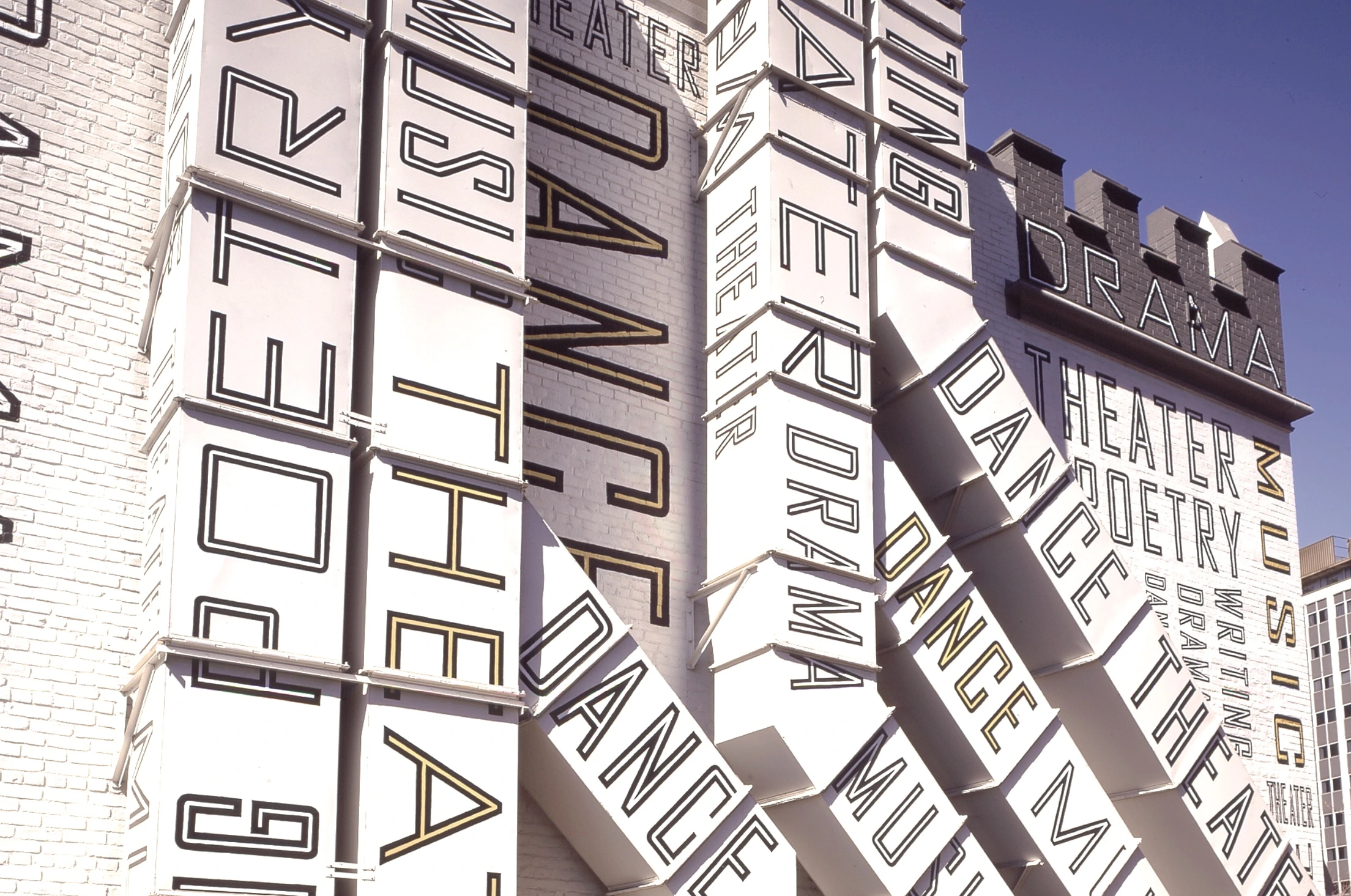 Words and vast letters running along the walls–an interior and exterior design of the New Jersey Performing Arts Center created by Paula Scher.