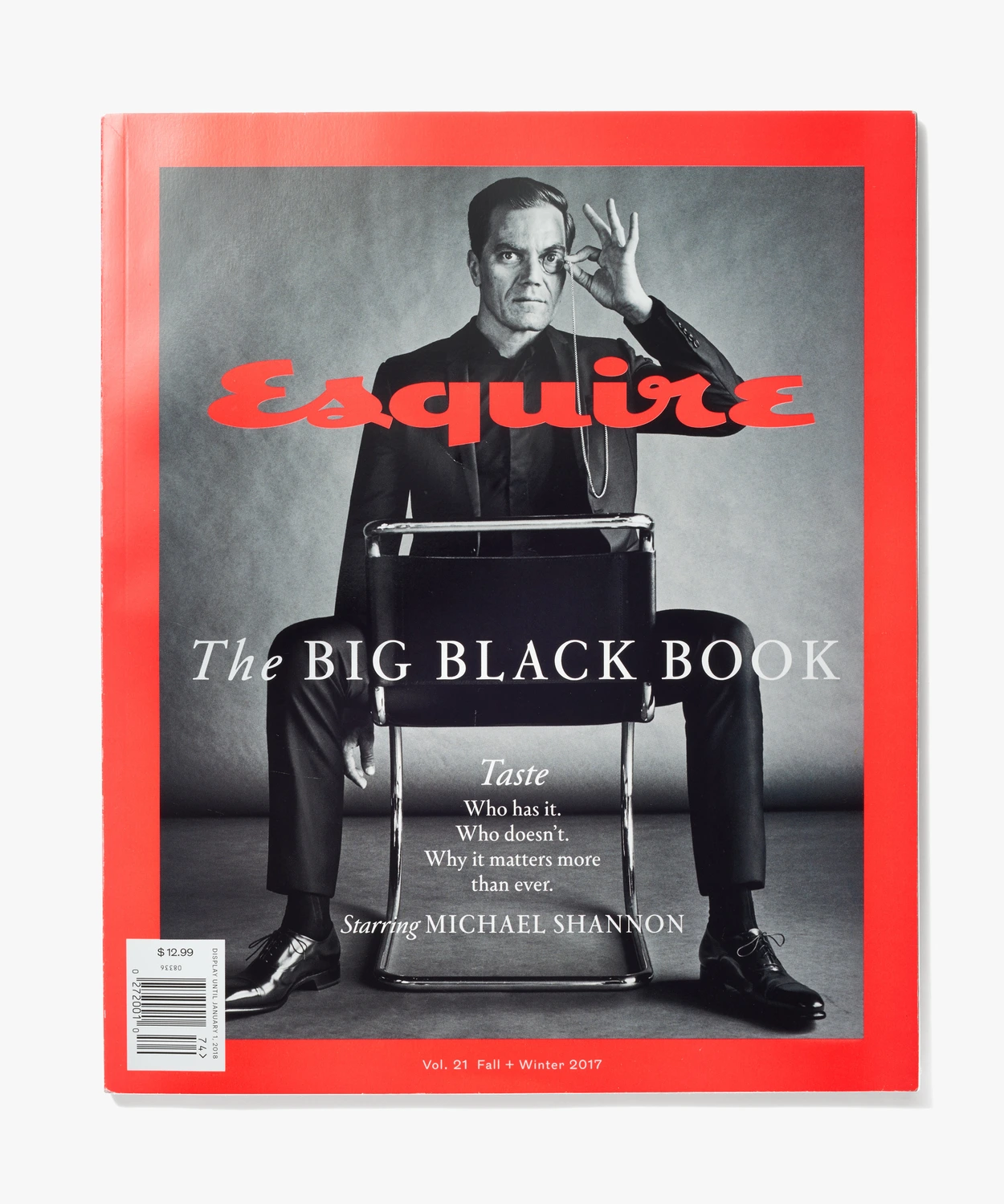 The Big Black Book, a fashion supplement for Esquire magazine. A sitting man with a monocle