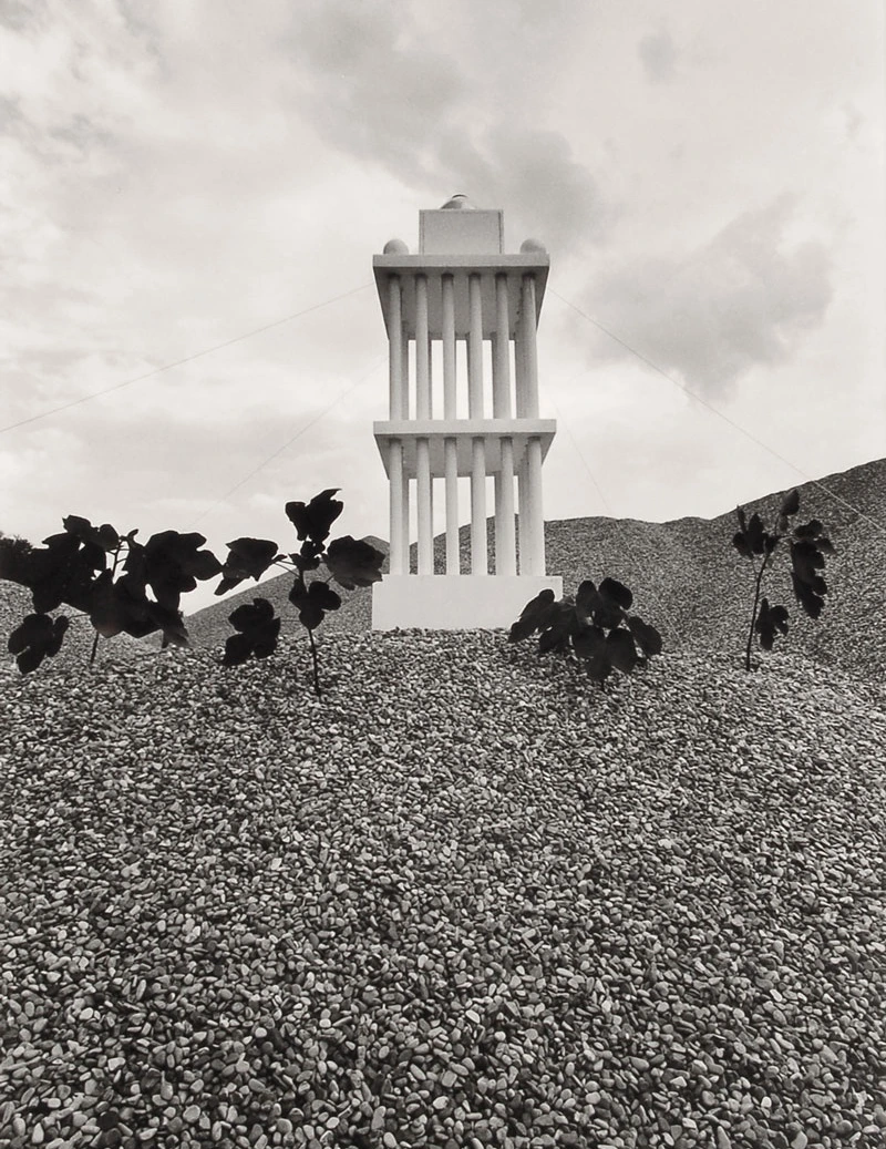 A pavillion on a top of a pebble hill. Photo by Ettore Sottsass