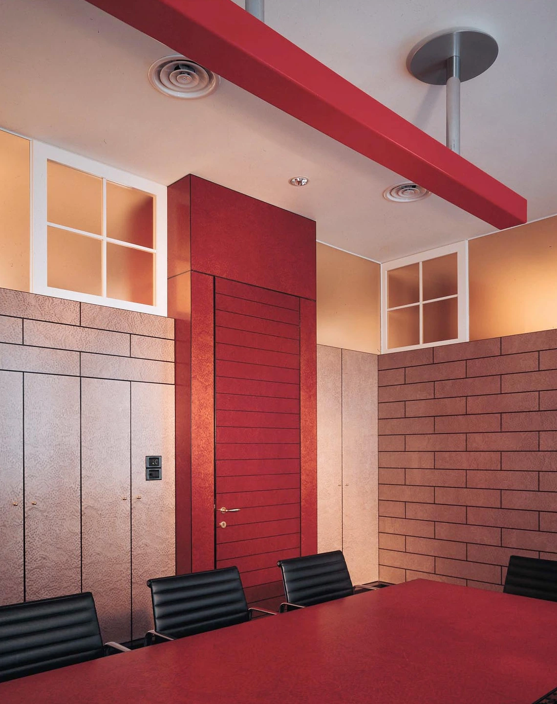Offices of Cementeria di Merone, Milan. An interior of a room