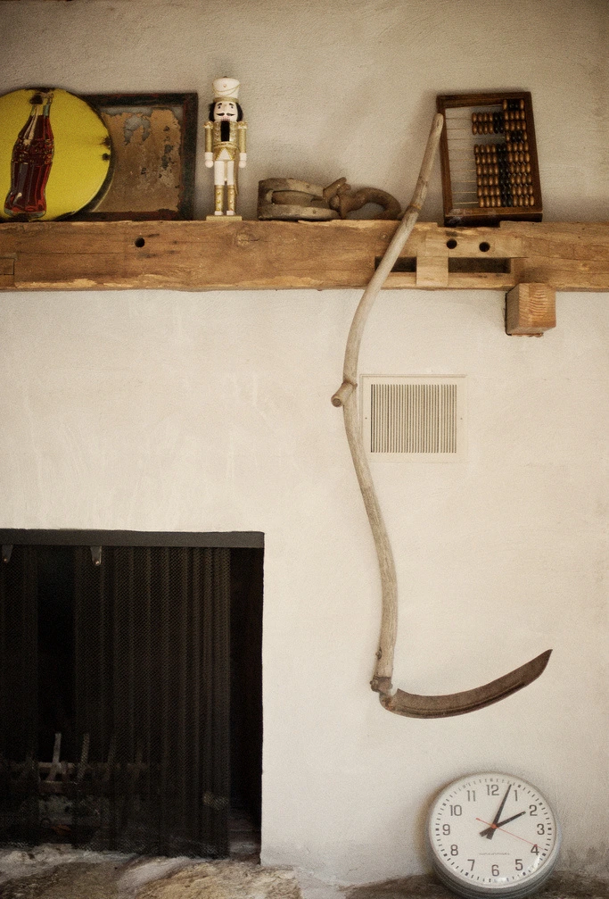 In the house of Anton Ioukhnovets and his family in Putnam Valley. A scythe, a clock, a mantelpiece