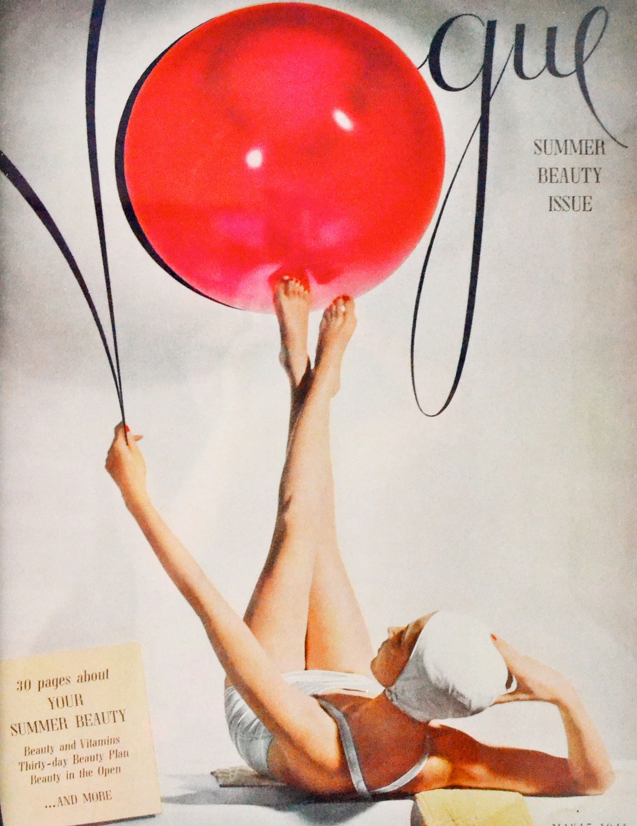 Vogue cover, May 1941. A female gymnast performing with a ball