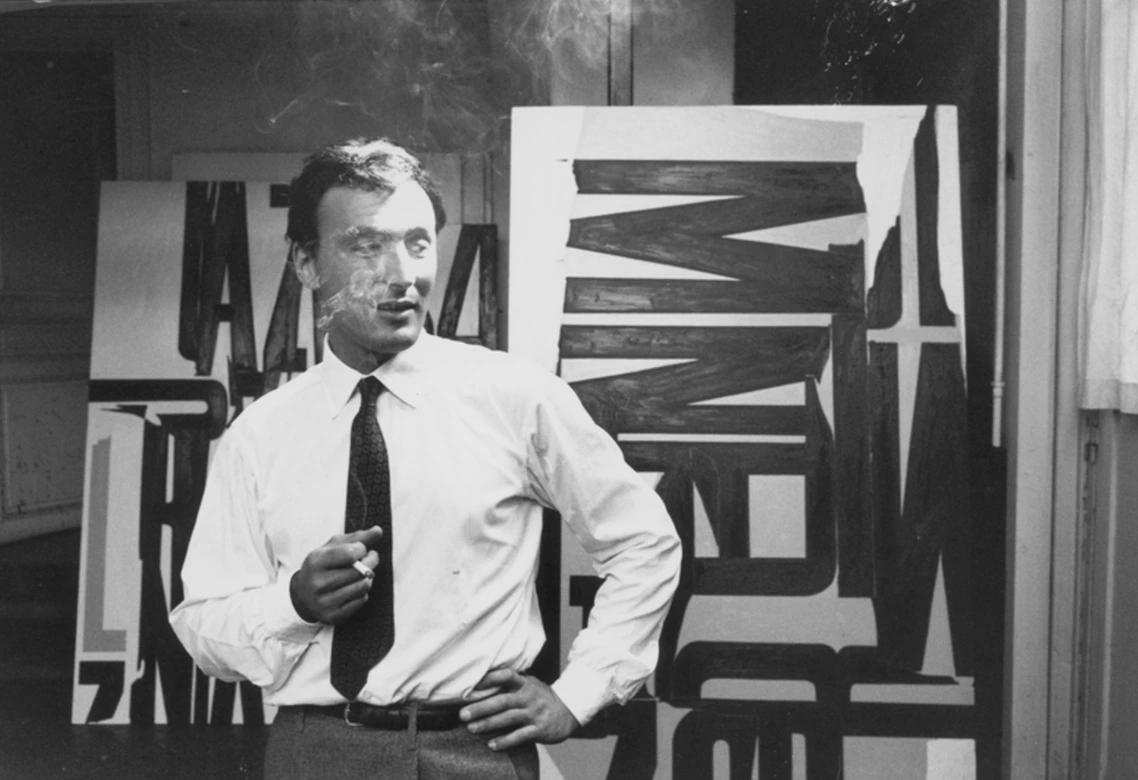 William Klein smoking a cigarette