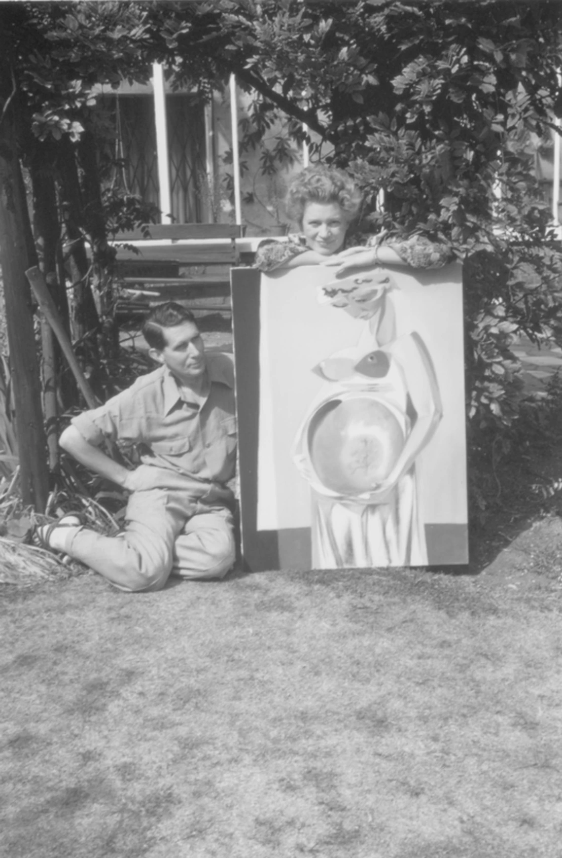 Lee Miller with a woman and a painting