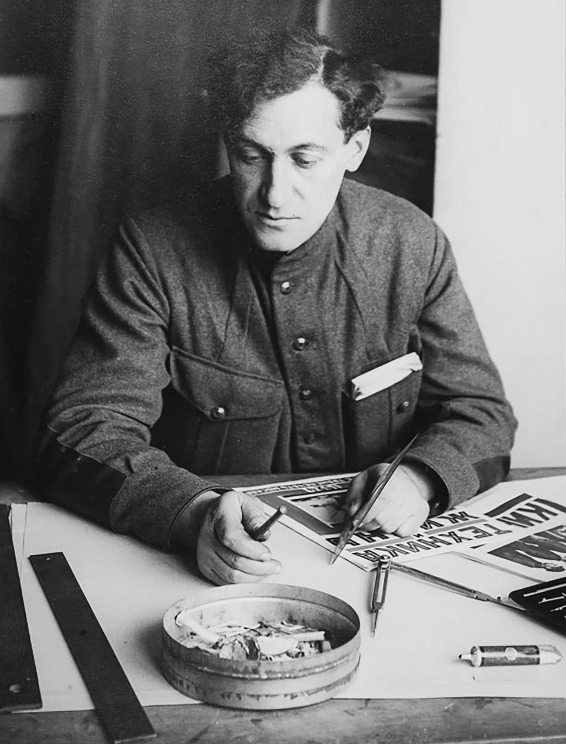 Aleksei Gan sitting at his desk