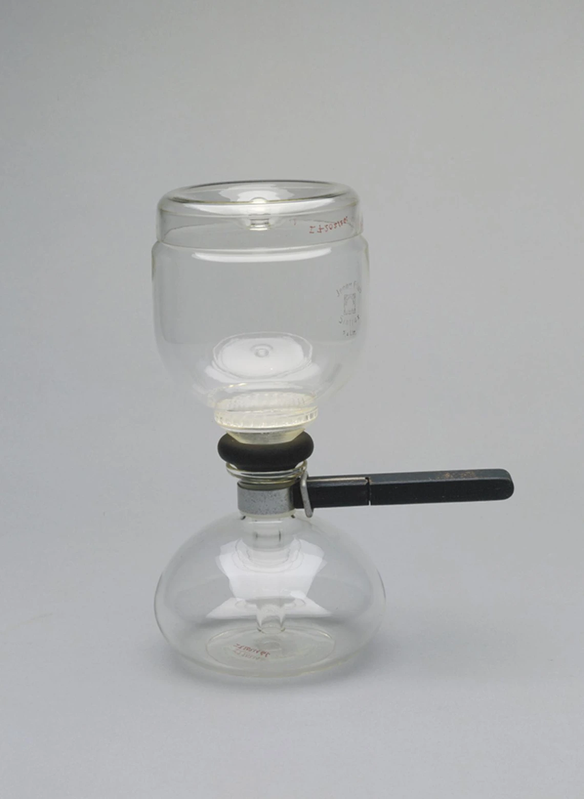 Sintrax, 3/4-Liter coffee maker. A coffee maker made of transparent glass with a black handle