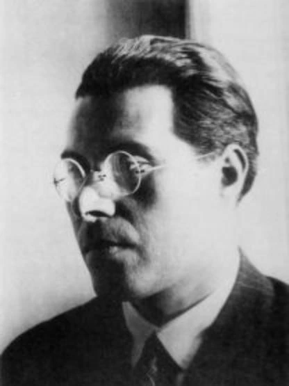 László Moholy-Nagy wearing glasses, looking sideways