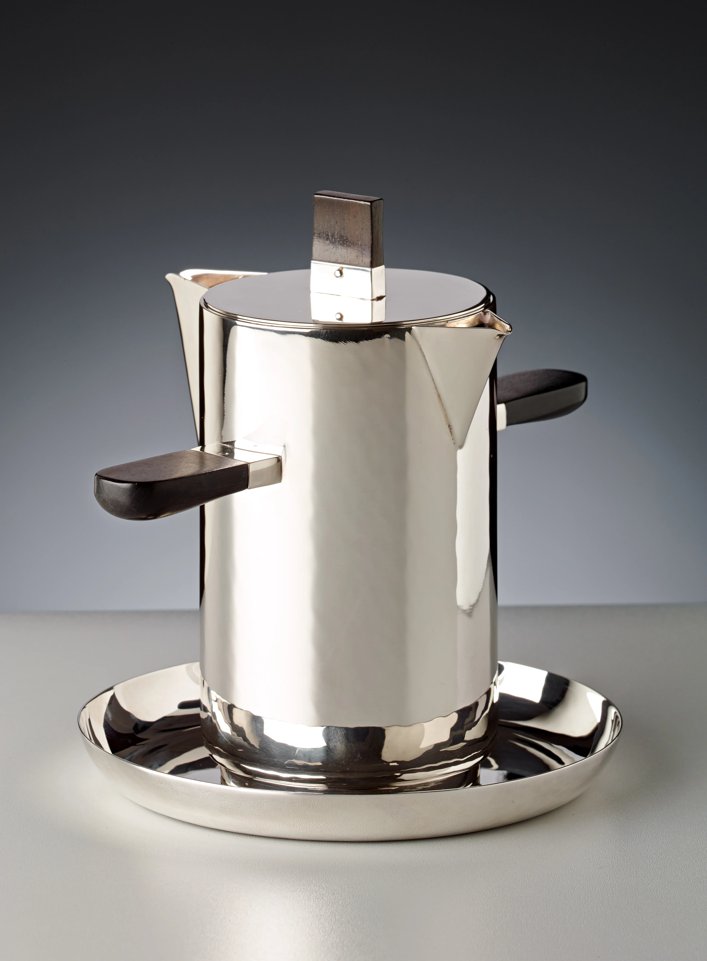 Fat lean saucer designed by Wilhelm Wagenfeld