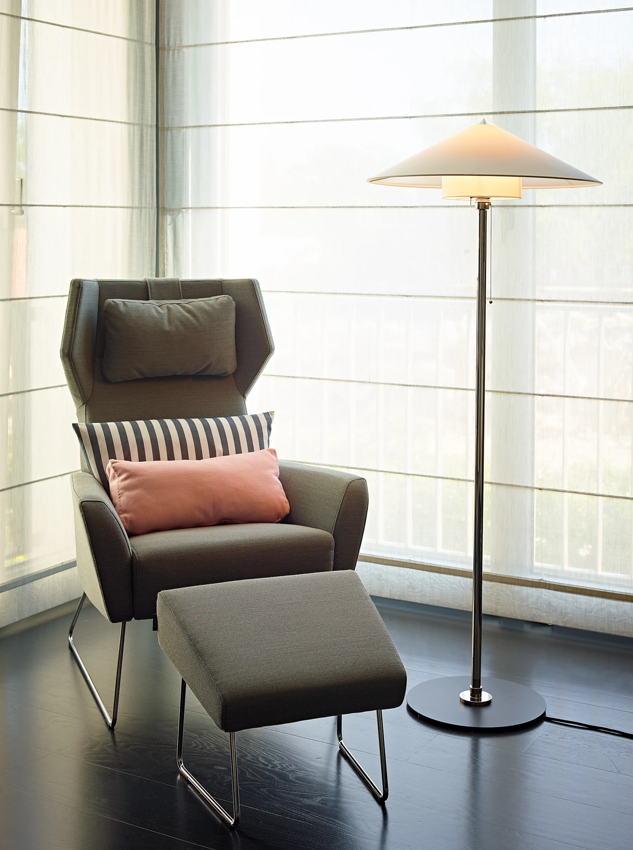 WST L 30 floor lamp standing next to an armchair