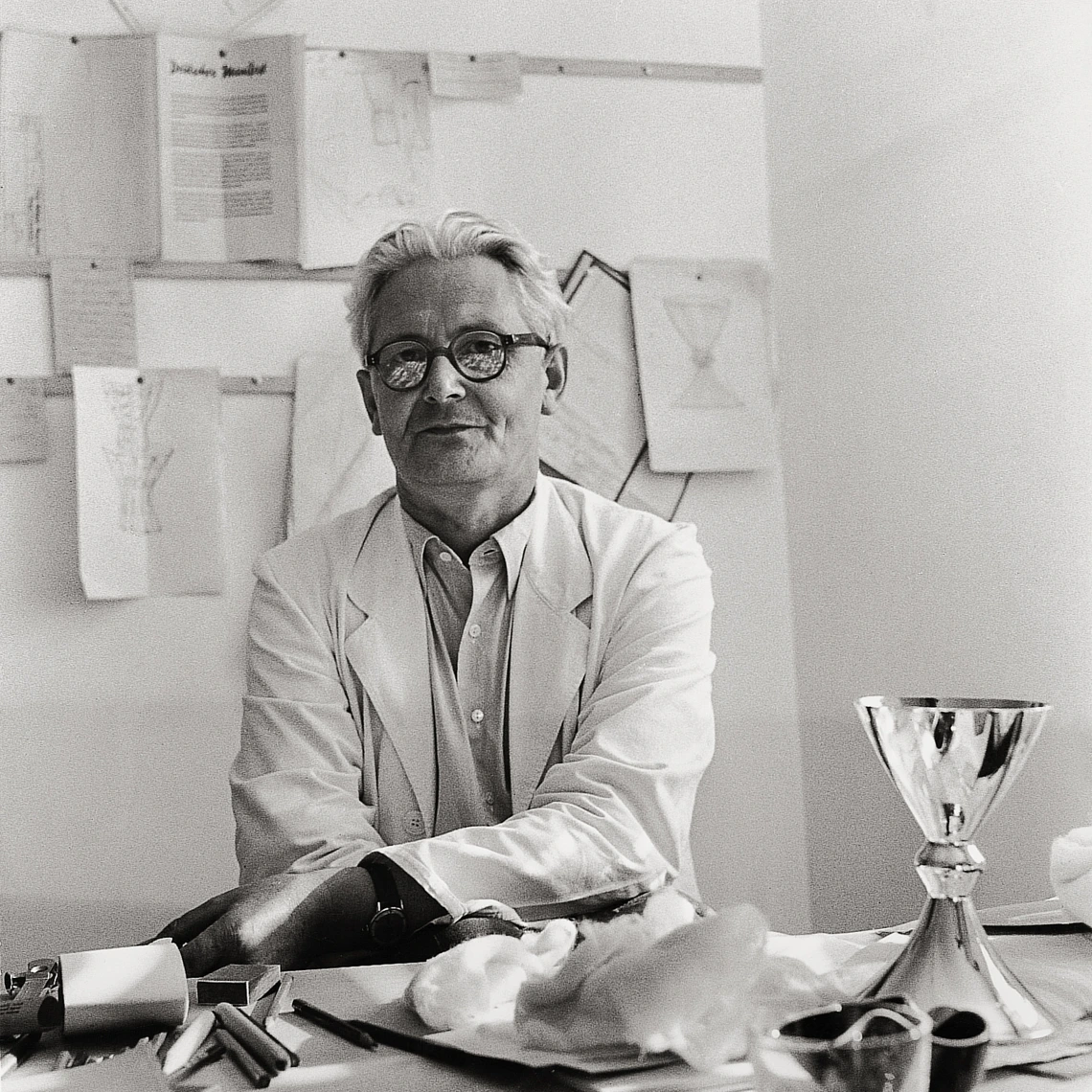 Wilhelm Wagenfeld wearing glasses, looking into camera
