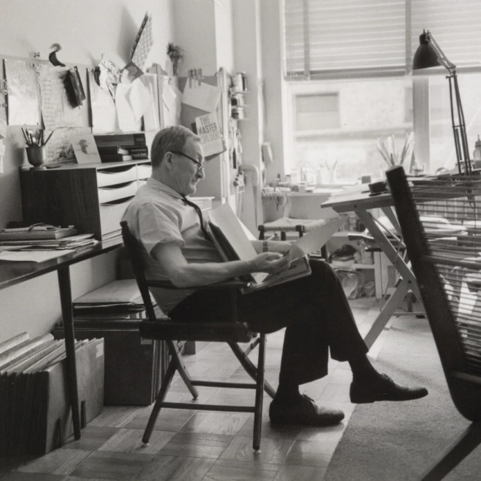 Alexey Brodovitch sitting and working