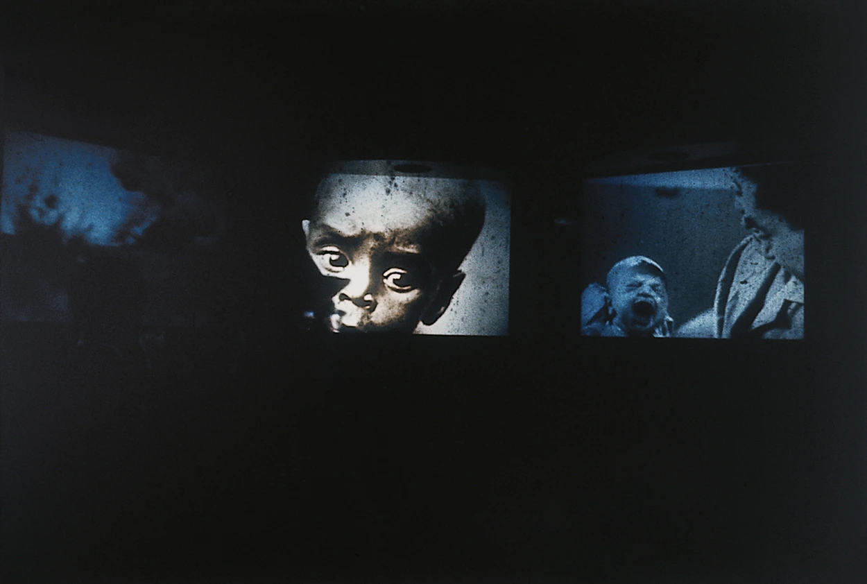 Man the provider theme pavilions. Inside of a pavilion with human faces projected on walls