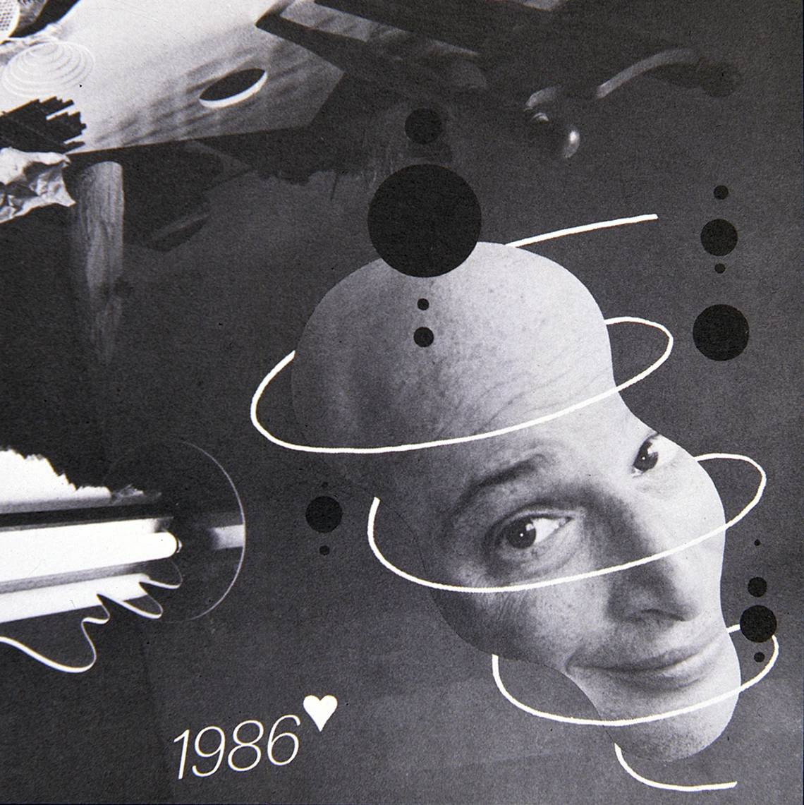 New Year&#x27;s Card. A face, black circles and a number 1986 floating in space