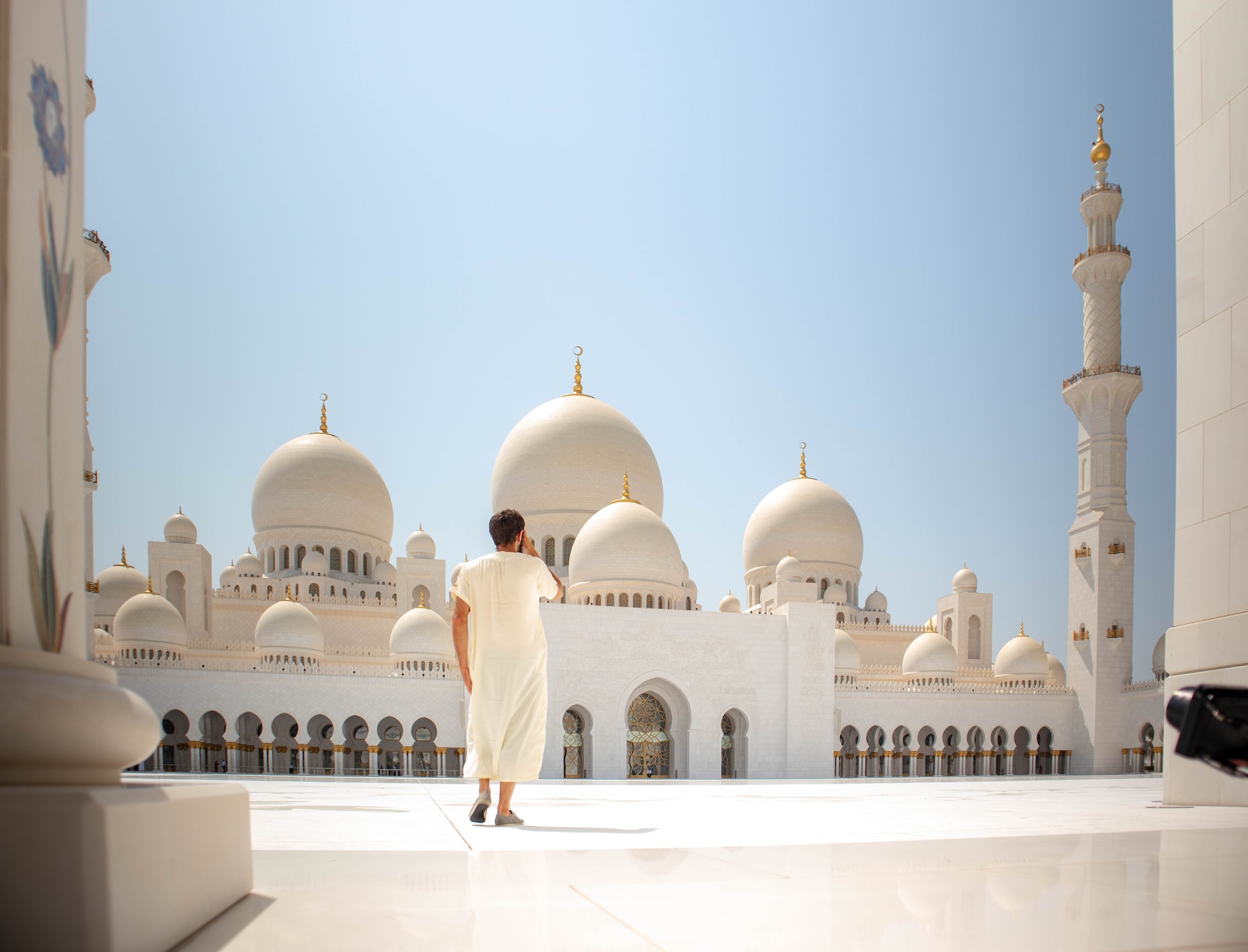 Beautiful mosque with white domes and minarets
