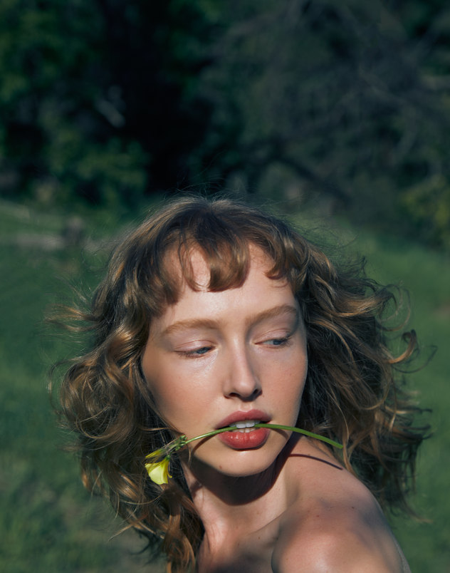 Vogue Portugal — fashion editorial portrait in natural light, photographed by Kourosh Sotoodeh.