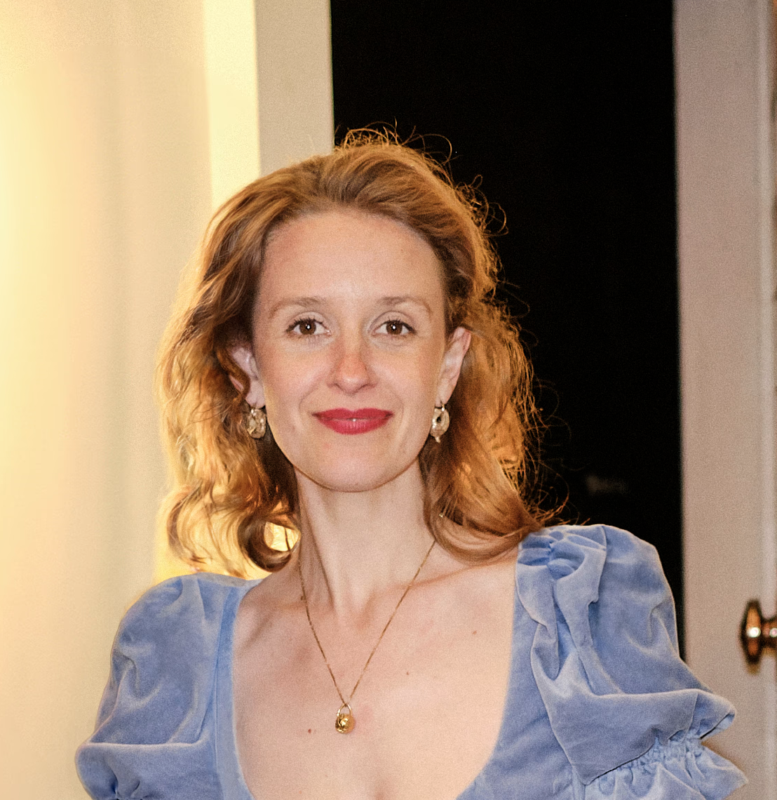 Yashka Moore official portrait photograph writer designer 