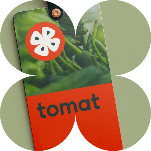 Image du logo de tomat dans une forme de fleur.