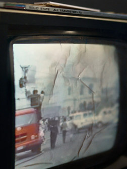 Replica vintage television broadcasting news footage of the 1979 fire at the Central Penitentiary of Costa Rica